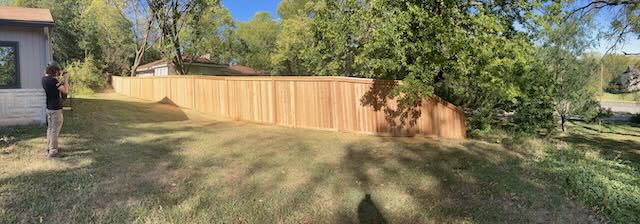Wide angle shot of a western red cedar fence